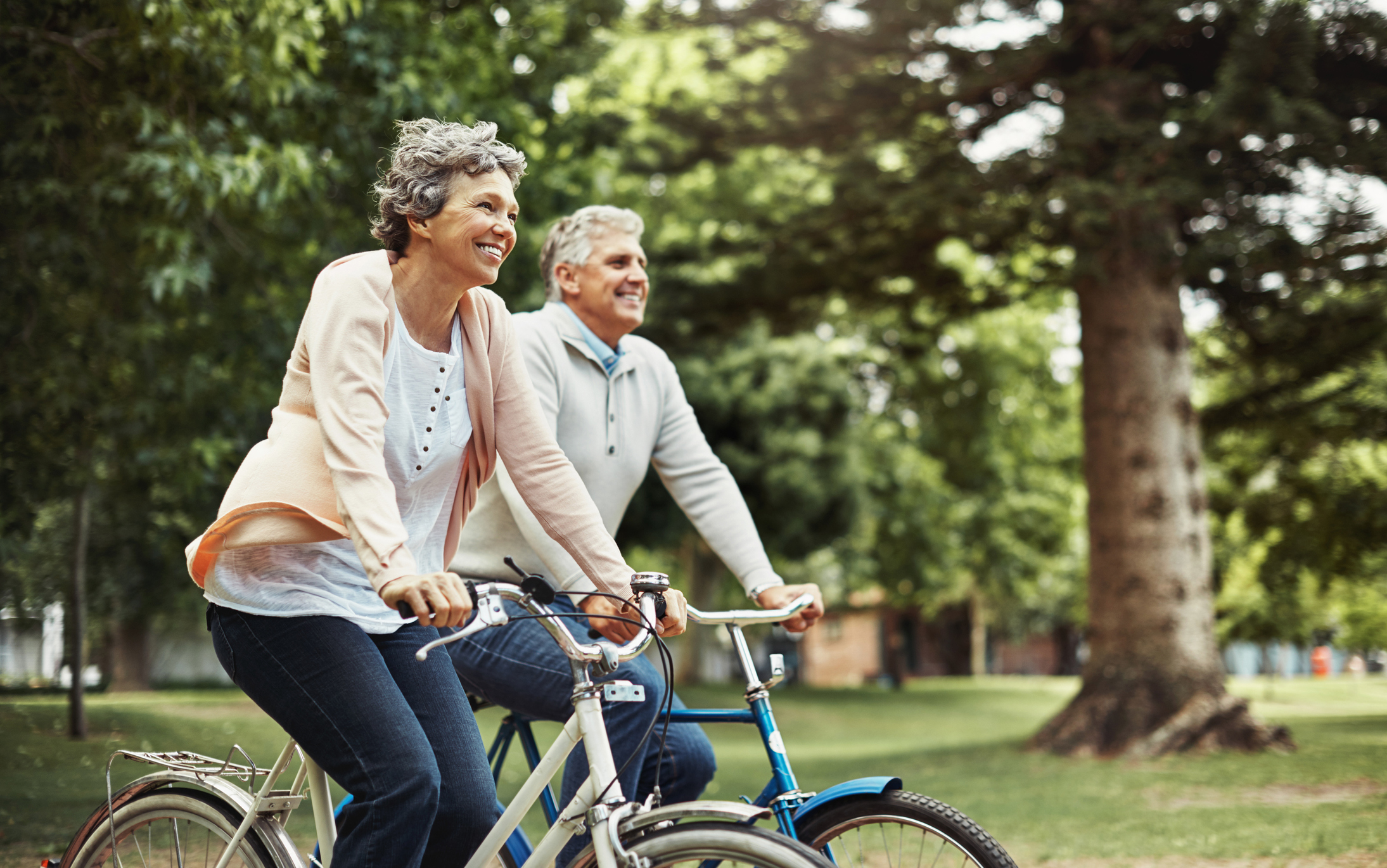 active seniors riding a bike
